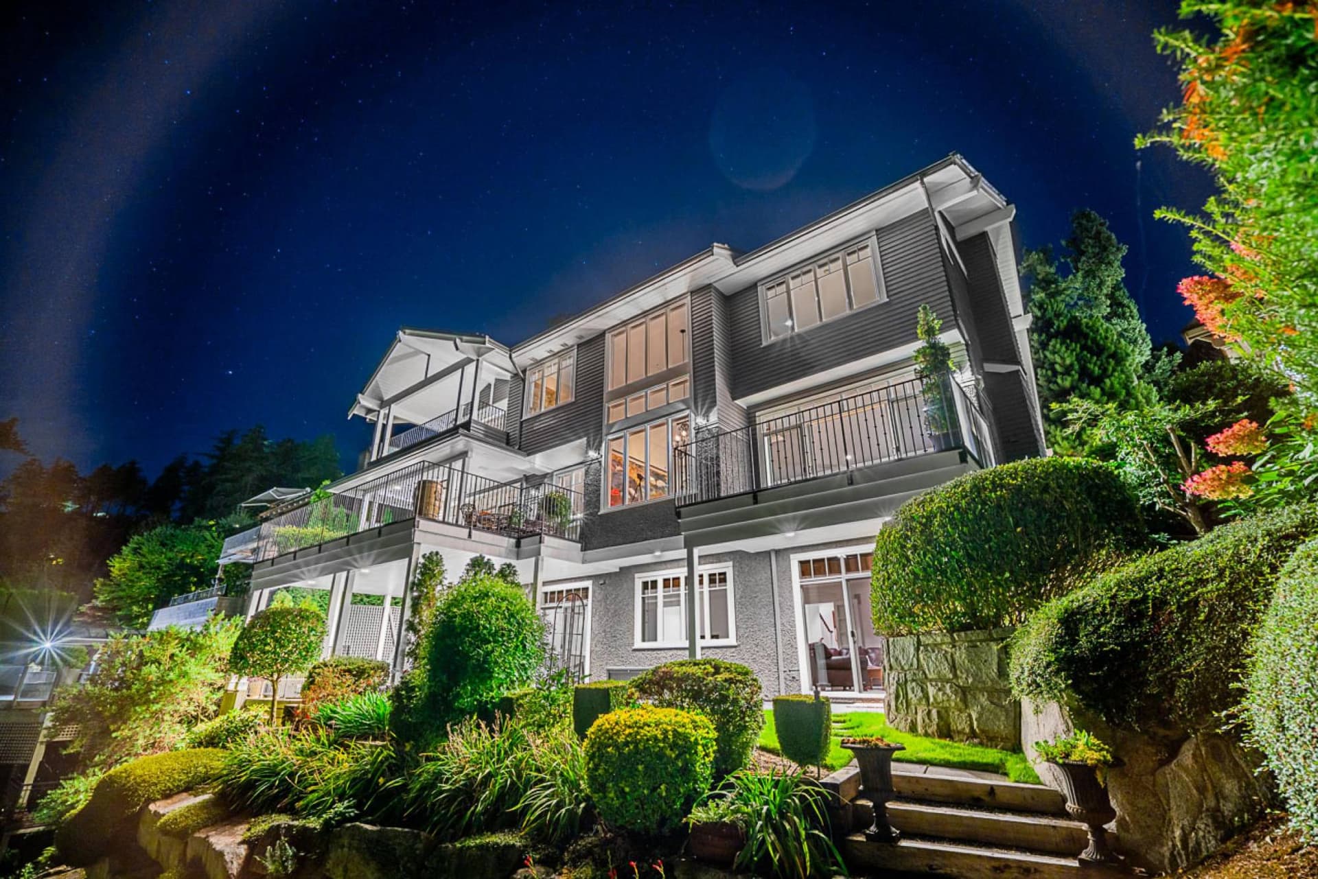 Multi-level home under a night sky
